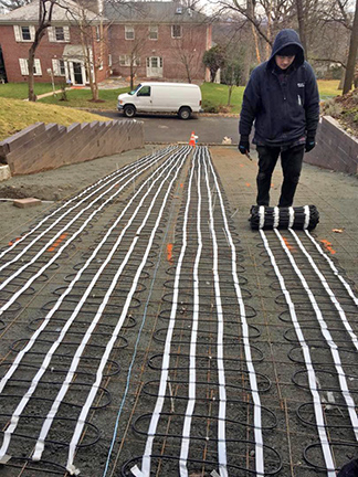 Heated driveway being installed.