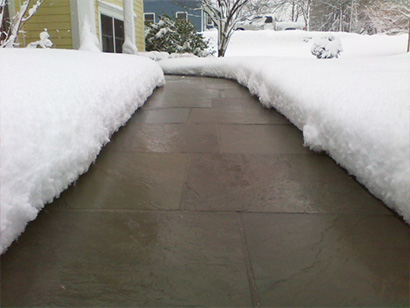 A heated paver walkway. A heated paver sidewalk.